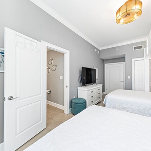 Stream your favorite shows from the guest bunk room with two lofted twins above two cozy queen beds