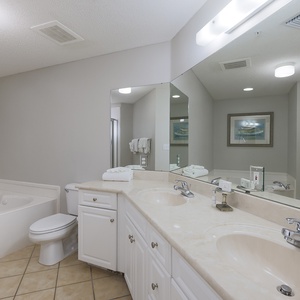 Refresh in the master bath after a day of adventure with a soothing jetted tub and relaxing walk-in shower