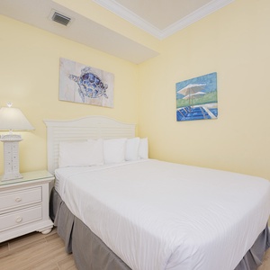 Sleep peacefully in this queen guest suite, surrounded by cheerful decor and a warm, inviting atmosphere