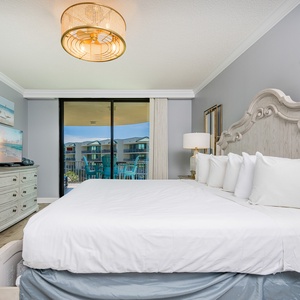 Rest in the king bed as you listen to gentle breezes, with stunning bay views just beyond your balcony from the master suite