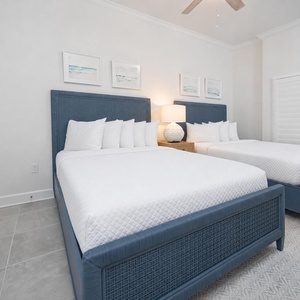 Relax on one of the cozy queen beds in this guest suite and enjoy a peaceful slumber
