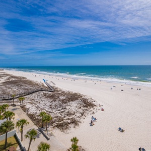 Tranquil, endless blue stretches across the coast as you savor peaceful moments from your balcony