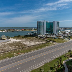 Take in the serene water views and charming homes from the balcony vantage point, perfect for relaxation