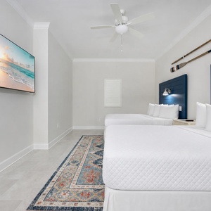 Rest in this queen guest suite streaming your favorite shows after an exciting beach day
