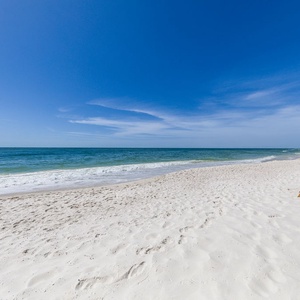 Soak up the sun in the soft sand with beach chairs and umbrellasand enjoy the beautiful shoreline and sparkling waters