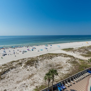 Enjoy the sparking beach, lazy river, pool, and waterslide views from your private balcony, perfect for relaxation