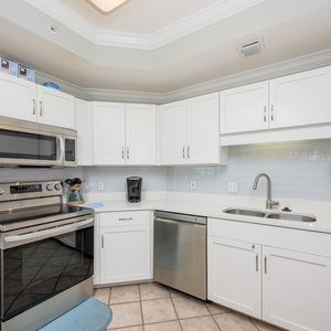 Craft your favorite recipes in this inviting kitchen, where you can delight in the stainless appliances and ample space