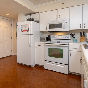 This kitchen features a spacious design and a welcoming atmosphere perfect for meal preparation