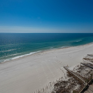 Experience seemingly endless coastline views of the horizon as waves lap the shore and the sun glistens over the water