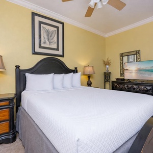 Sink into the queen guest suite's plush bed while the TV offers your favorite shows