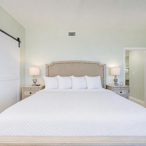 Calm your mind on the king bed in the master suite as gentle lamp light soothes your evening