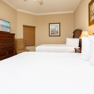 Unwind in this queen guest suite and stream your favorite shows or enjoy a good movie after a beach day