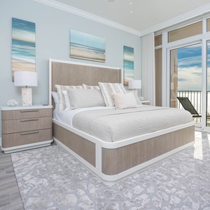 Retreat this this elegant king master suite for a peaceful night with the sound of the waves beyond the balcony