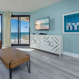 Relax in the comfortable recliner while enjoying views of the beach and a flat-screen TV in a welcoming space