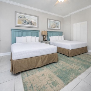 Relax on one of the cozy queen beds in this guest suite and enjoy a peaceful slumber