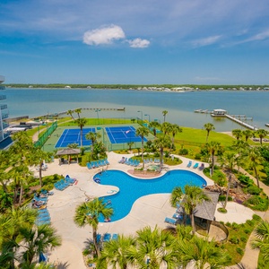 Enjoy a variety of amenities, including a refreshing pool, relaxing hot tub, tennis courts, lagoon-side view at the beautiful Gulf Shores Surf and Racquet Club