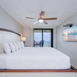 Drift into peaceful sleep on the plush king bed, with soothing beach vibes just steps away on your balcony