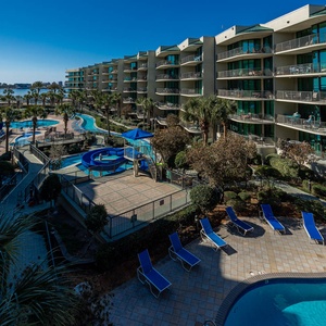 Discover the pool area with a refreshing lazy river and thrilling waterslide, just steps from the bay