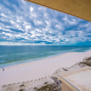 Experience breathtaking views of the beach from your private balcony, perfect for relaxation and sunset watching