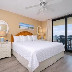 Experience restful nights in the king master suite, where plush bedding beckons after a day of beachside fun