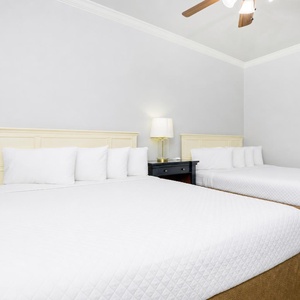 Relax on one of the cozy queen beds in this guest suite and enjoy a peaceful slumber