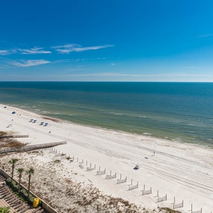 Experience seemingly endless coastline views of the horizon as waves lap the shore and the sun glistens over the water