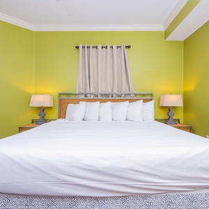 Sink into the soft king bedding and feel completely at ease in your serene coastal retreat