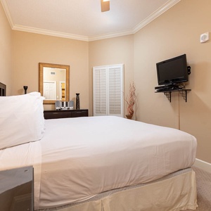 Relax on the cozy king bed in this guest suite and stream your favorite shows after a beach day