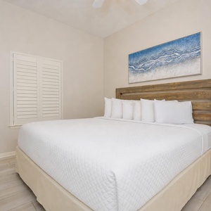 King guest suite that invites you to sink into cool crisp linens after a day spent exploring the coast
