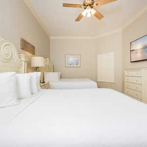 Relax after a day at the beach in this queen guest suite with a good movie