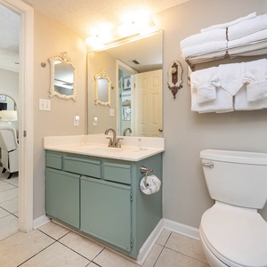 Bathroom featuring a walk-in shower and fresh towels for your comfort, accessible from the living space and bedroom