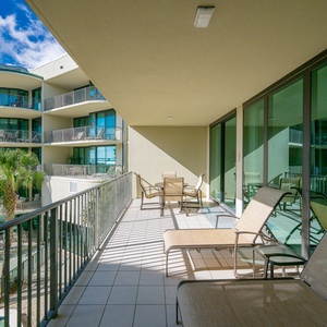Bask in the sun on the spacious balcony, savoring the soothing sounds of nature and coastal views