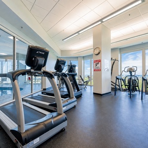 Stay active on vacation in the well-equipped exercise room while enjoying beautiful Gulf views through the windows