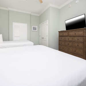 Rest in comfort on queen beds in this guest suite, watching your favorite shows as you unwind after a day of fun