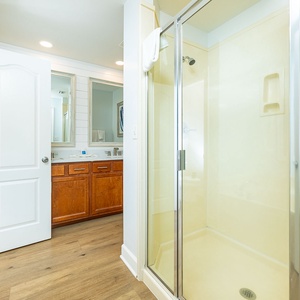 Refresh in the spacious master shower while enjoying elegant details that enhance your coastal getaway