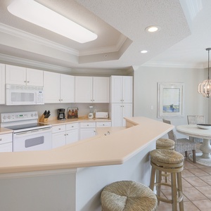 Sip your morning coffee at the breakfast bar and get ready for a day of adventure in this stylish space