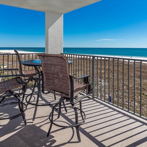 Balcony seating offers a relaxing spot to enjoy the gulf view and gentle sea breeze, perfect for unwinding after a day