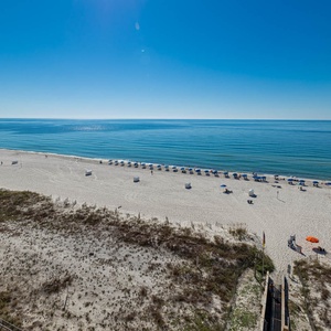 Relax and enjoy the serene coastal atmosphere from your beachfront balcony