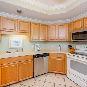 Create delightful snacks or meals in the inviting kitchen, designed for effortless culinary adventures