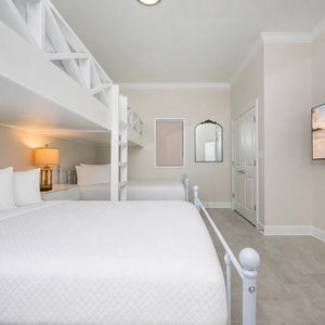 Enjoy a comfortable stay in this bunk room featuring two twins over two queens and a large TV