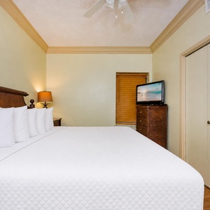 Fresh pillows line the king bed in the suite inviting you to unwind after a day of coastal adventure