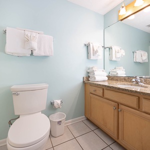 Experience a clean and inviting guest bath with a spacious vanity, fresh towels, and a bright atmosphere for your routine
