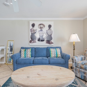 Cushion your feet on the rug and sink into the sofa queen while the lamp casts a soft glow nearby