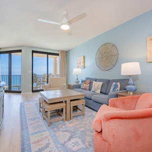 Soft coastal sounds mix with a gentle breeze as you relax in your cozy living room with gulf shore views