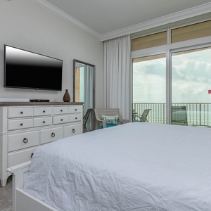 Sink into the king in the master and enjoy your favorite shows while the beach view envelops the room in tranquility