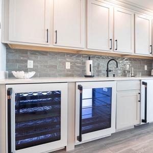 Pick a chilled bottle to enjoy from this elegant wet bar choice of wine cookers or create your favorite cocktail 