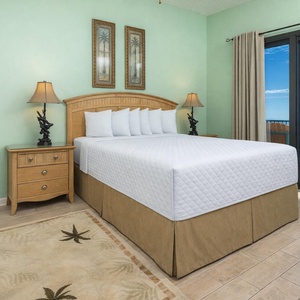 Feel the comfort of soft bedding as you recharge for another exciting beach day in the king master suite
