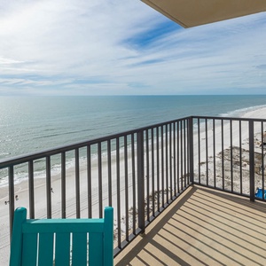 Enjoy the refreshing breeze from the west corner balcony while taking in the expansive beach views