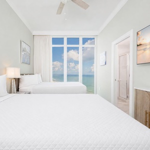 Unwind in this queen guest suite and stream your favorite shows or enjoy a good movie after a beach day