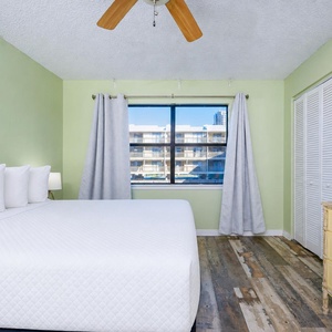 Relax on the double bed in the guest suite as you catch the hum of nearby activity through the window